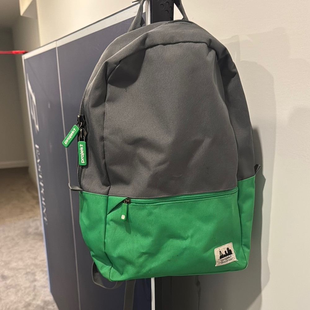 Sporty Gray and Green Backpack with Durable Design